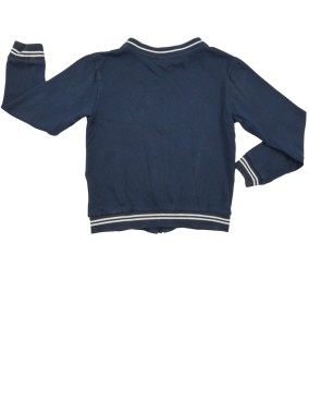 Veste bleue marine liseré U ESSENTIEL taille 10 ans